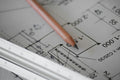 Architectural drawings and pencil on desk — local area planning application review england